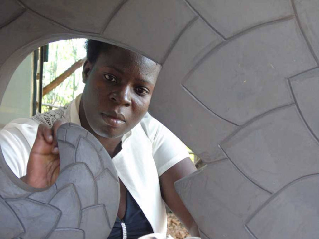 Winnie working on Pangolin Sculpture